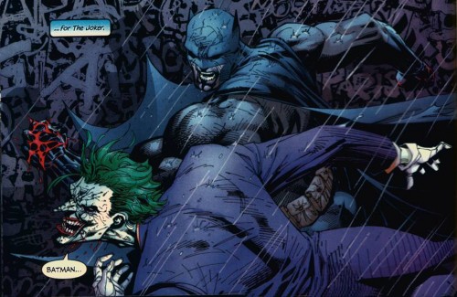 batman punches out the joker