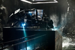 batman and the batwing from the bat movie in the batcave