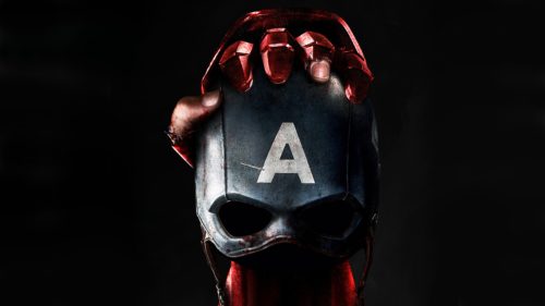 iron man holding captain america’s helmet
